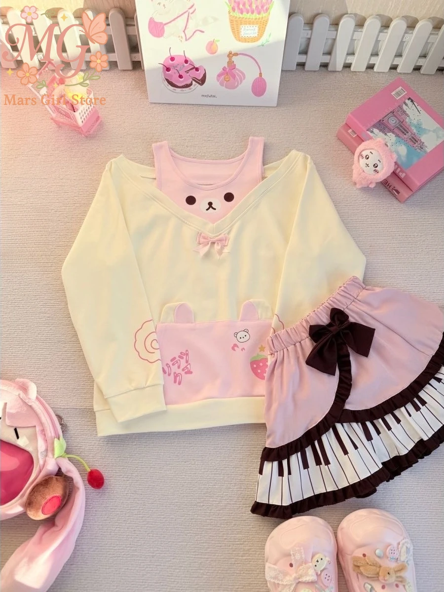 

Японский кавайный комплект из 2 предметов, женские топы в стиле Лолиты с длинными рукавами и клубничным принтом медведя + короткая юбка с высокой талией и милым бантом, мини-юбки