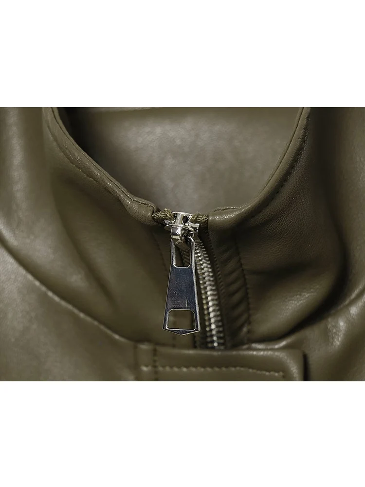 سترة جلدية شتوية بياقة واقفة للنساء كاجوال بأكمام كاملة وسحاب بلون سادة معطف قصير فضفاض للسيدات ملابس خروج عصرية