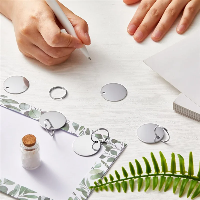 ABGR-Bulk 100 عبوة من الفراغات المستديرة المصنوعة من الفولاذ المقاوم للصدأ، علامات معدنية بفتحة، مناسبة للنقش والحرف اليدوية