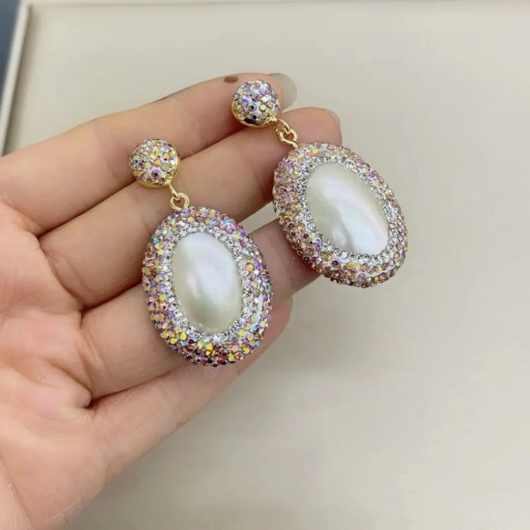 

Cross-border source factory boutique natural earrings, fashionable pearl European stud earrings straight wholesale