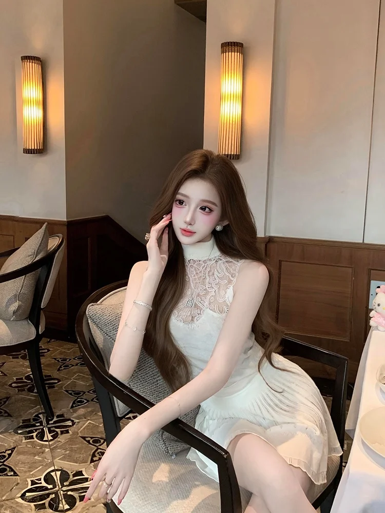 

Unique Beautiful Summer New Women's Knitted Sleeveless Top And Short Skirt Two-Piece Set Fashionable Sexy Short Length