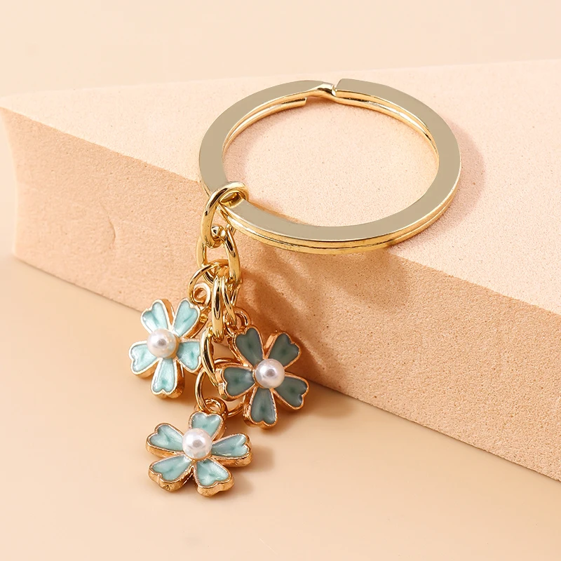 Aihua 40 Farben Niedlicher Pflanzen-Schlüsselanhänger Emaille Sakura-Blumen-Schlüsselanhänger für Frauen Mädchen Handtasche Anhänger Autoschlüsselhalter DIY Schmuck Geschenke – Detail 33