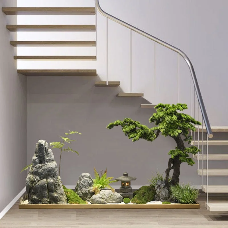 Simulated welcome pine landscape under the stairs Hotel villa under the stairs Rockery stone green plants Chinese landscaping In