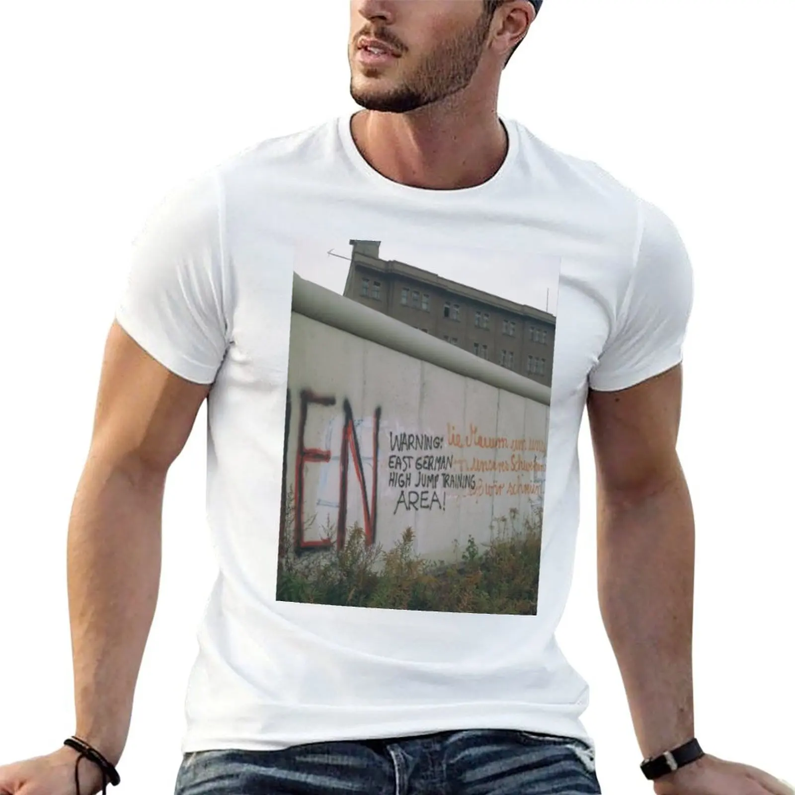 Amusing/funny Berlin Wall graffiti - East German High Jump training area T-Shirt t shirt man designer T-Shirt