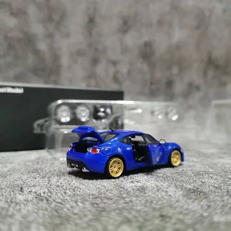 Radiant Artisan-coche modelo BRZ ZC6, vehículo fundido a presión de aleación, todas las puertas abiertas con motor y un juego de buje de repuesto, 1:64