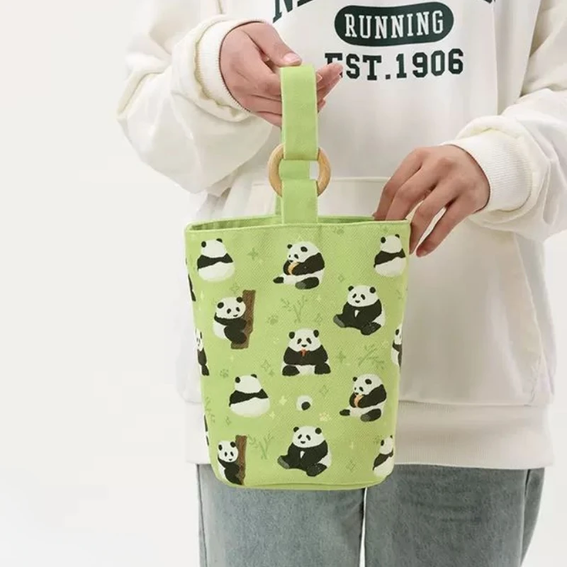 Bolso de mano de lona con estampado de dibujos animados de Panda, Mini bolsa de cubo portátil, bolsa de almuerzo linda, bolsa de almacenamiento informal de viaje, nueva tendencia que combina con todo