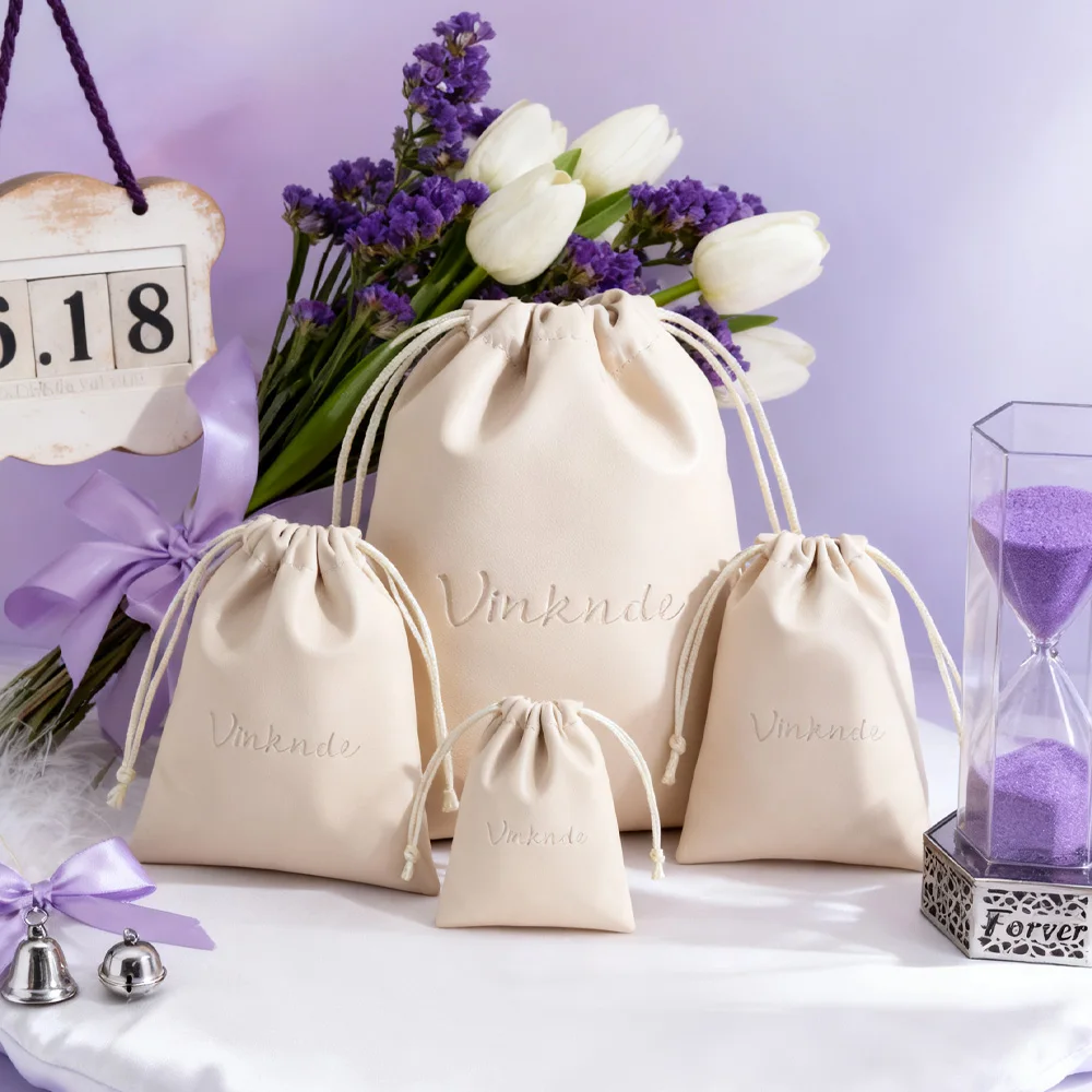 

100Pcs Custom Beige PU Leather Jewelry Drawstring Gift Bags 8x10cm 9x12cm 10x15cm 13x18cm Christmas Makeup Ring Drawstring Pouch