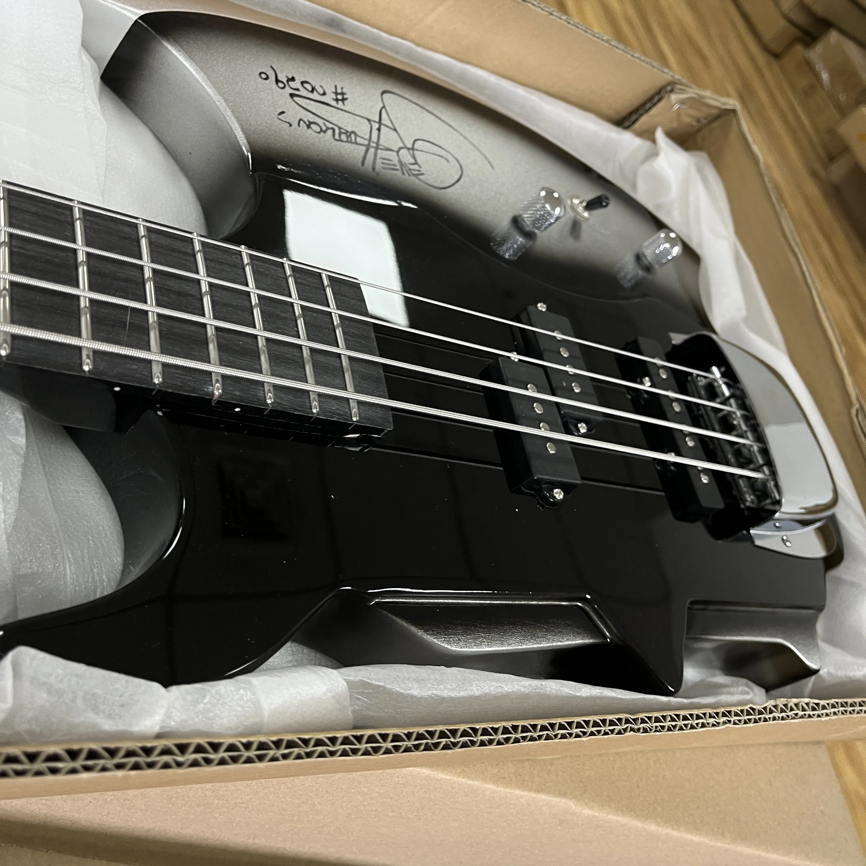 Costom Axe 4-string Electric Bass Guitar Shiny Black Body With Silver Blade Panel Split Pickups Chrome Hardware Accessories Gife