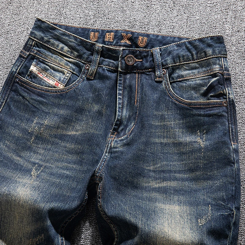 

Fashionable new men's elastic slim fit retro blue jeans, scratch washed retro denim, lead embroidery pen pants, hombre