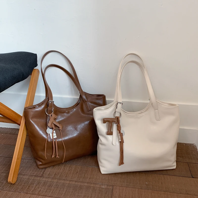 

High Quality PU Tote Bags All-match Solid Simple Versatile Zipper Handbags for Women 2025 New Style Single Shoulder Commuter Bag