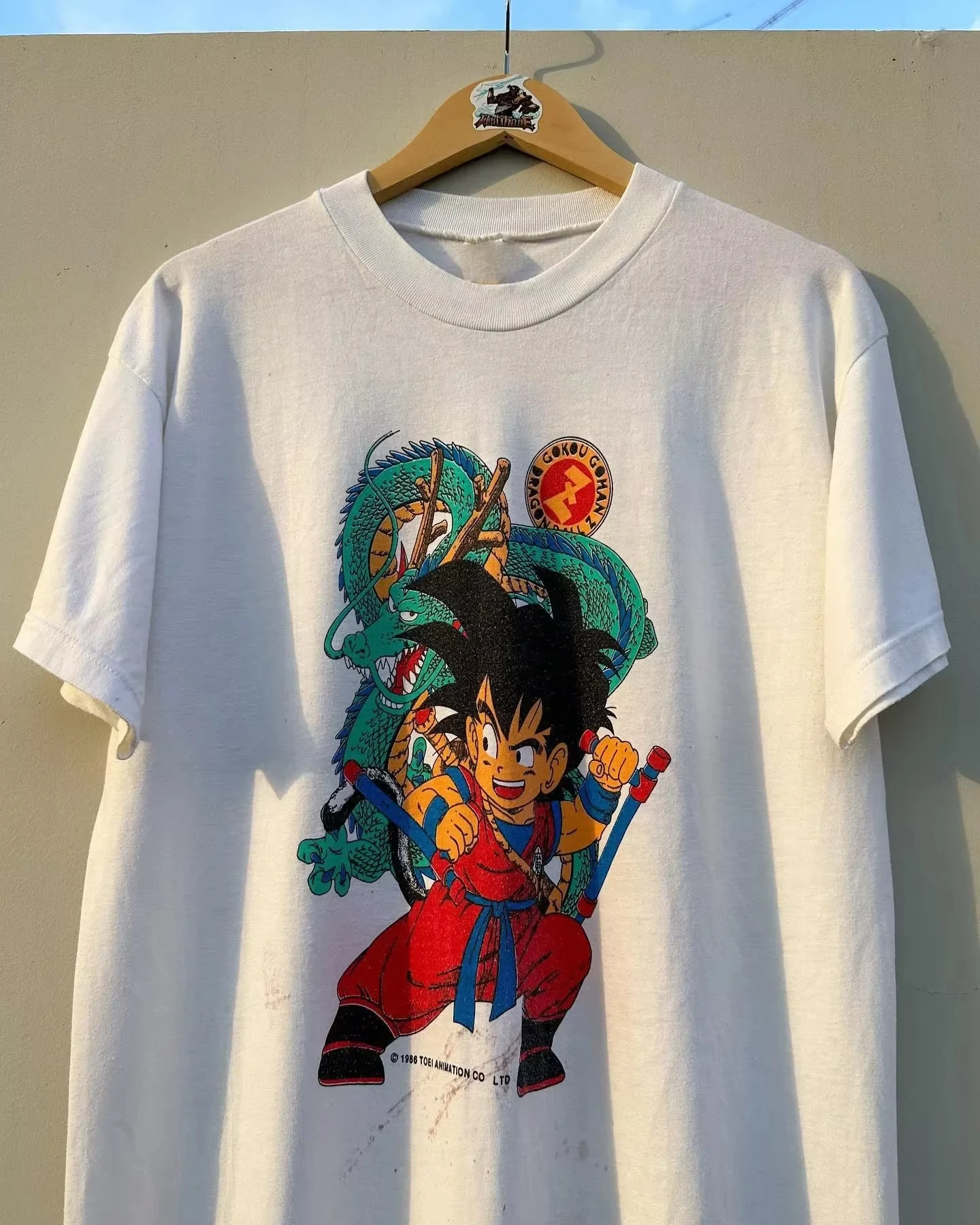 เสื้อยืดแขนสั้นลายการ์ตูนดราก้อนบอลญี่ปุ่นสำหรับผู้ชายและผู้หญิง คอลเลคชั่นใหม่ประจำปี 2026 สไตล์อเมริกันสุดเทรนดี้ ลำลอง เหมาะสำหรับพ่อแม่ลูก