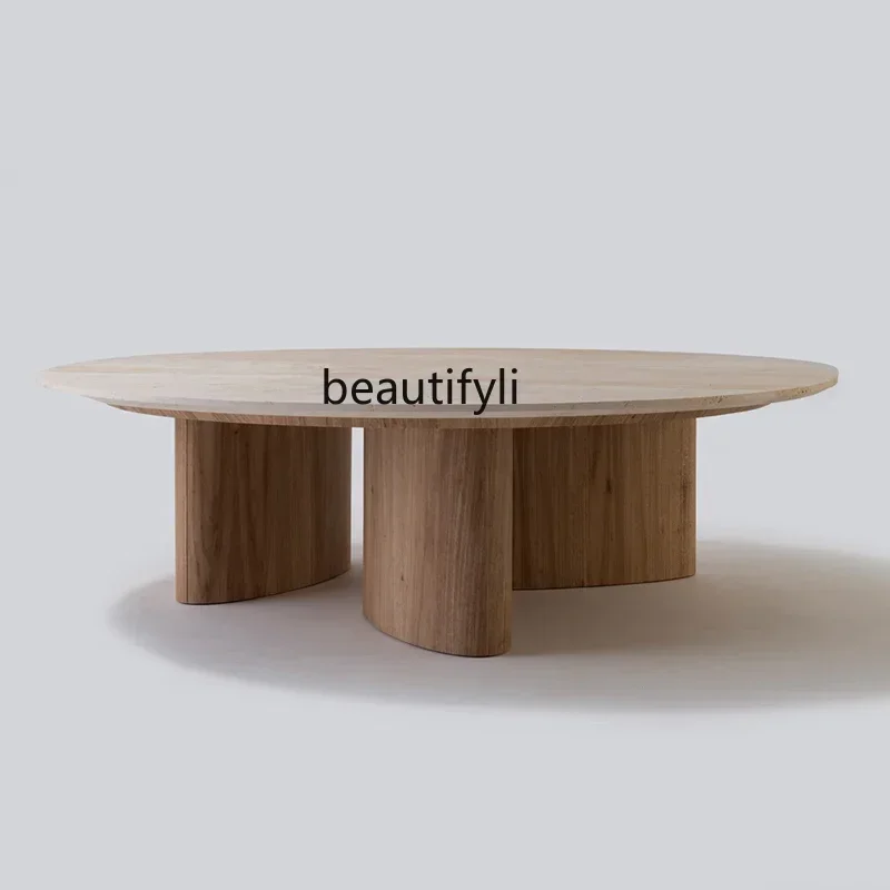 

Y Nordic simple travertine is now a light luxury small apartment living room round wabi sand wind marble solid wood e table