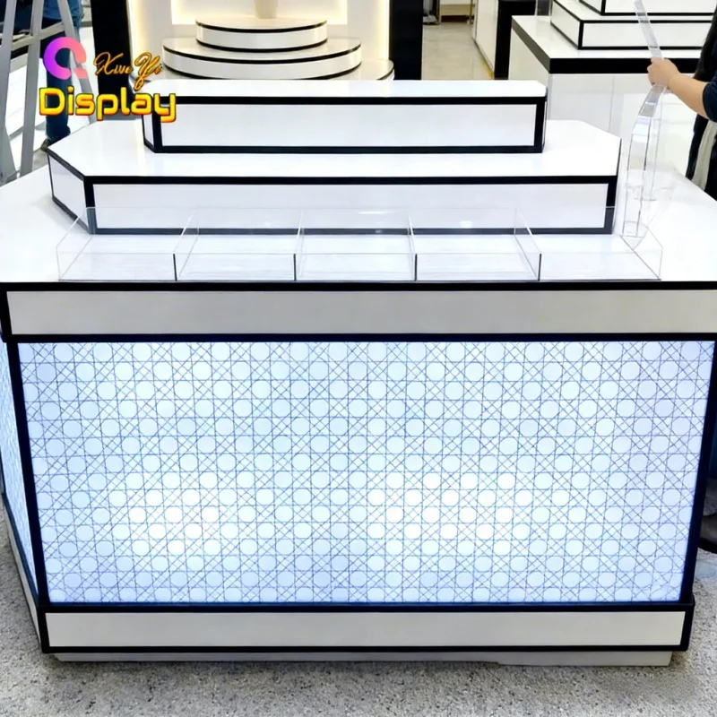 custom.Custom Modern Luxury LED Lit Stainless Steel Perfume Shop Table Display Fragrance Display Cabinets Cosmetic