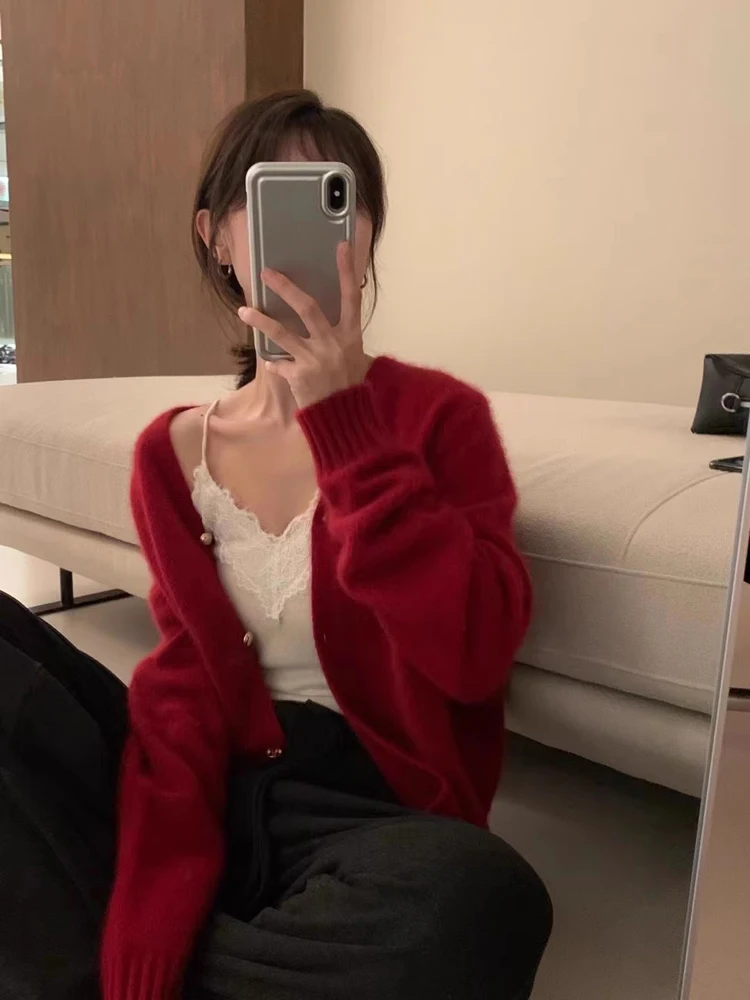 

100% pure cashmere knitted cardigan sweater ladies loose with V-neck giant soft waxy sweater coat jacket.