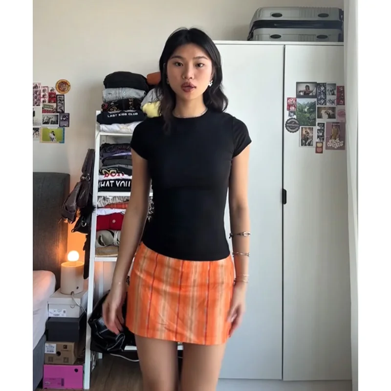

Американская ретро-юбка в оранжевую клетку для женщин с шортами, низкой талией, утягивающая, с вертикальным полосатым принтом, короткая юбка