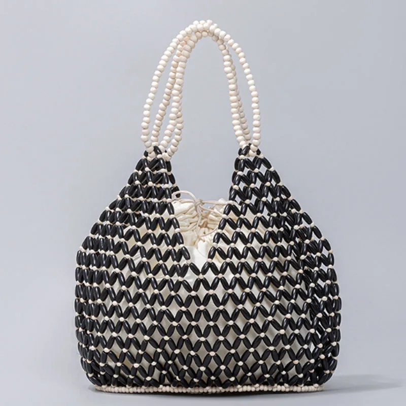 Handwoven women handbag 2024 new design hollow out women bag fashion and casual bucket bag shoulder bag