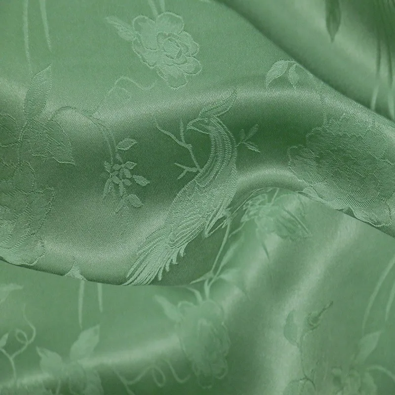 

Three-dimensional embossed Chinese-style cheongsam made of silk jacquard satin fabric