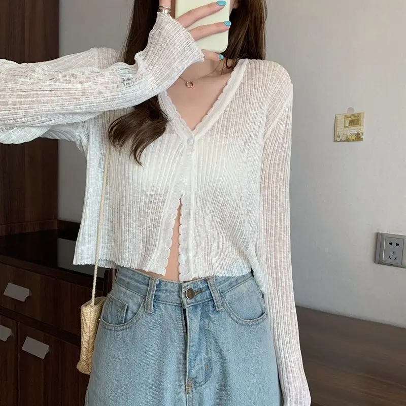 Vento suave primavera/verão gelo seda manga longa malha curto cardigan casaco feminino micro transparente roupas de proteção solar