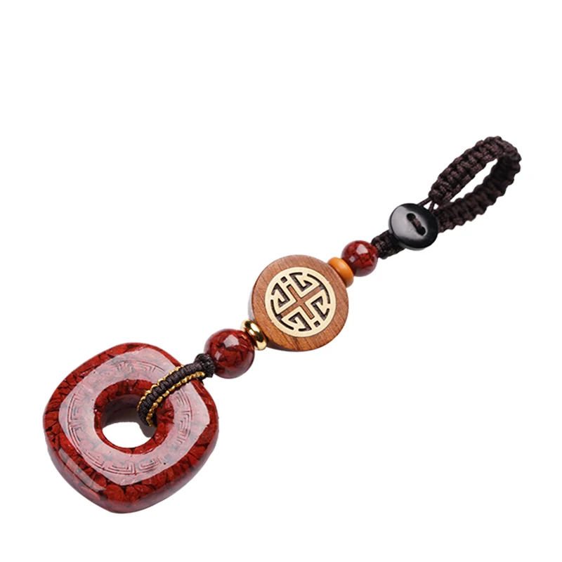 Natural crystal cinnabar safety buckle pendant, fidelity, high-content keychain, male and female natal year pendant.