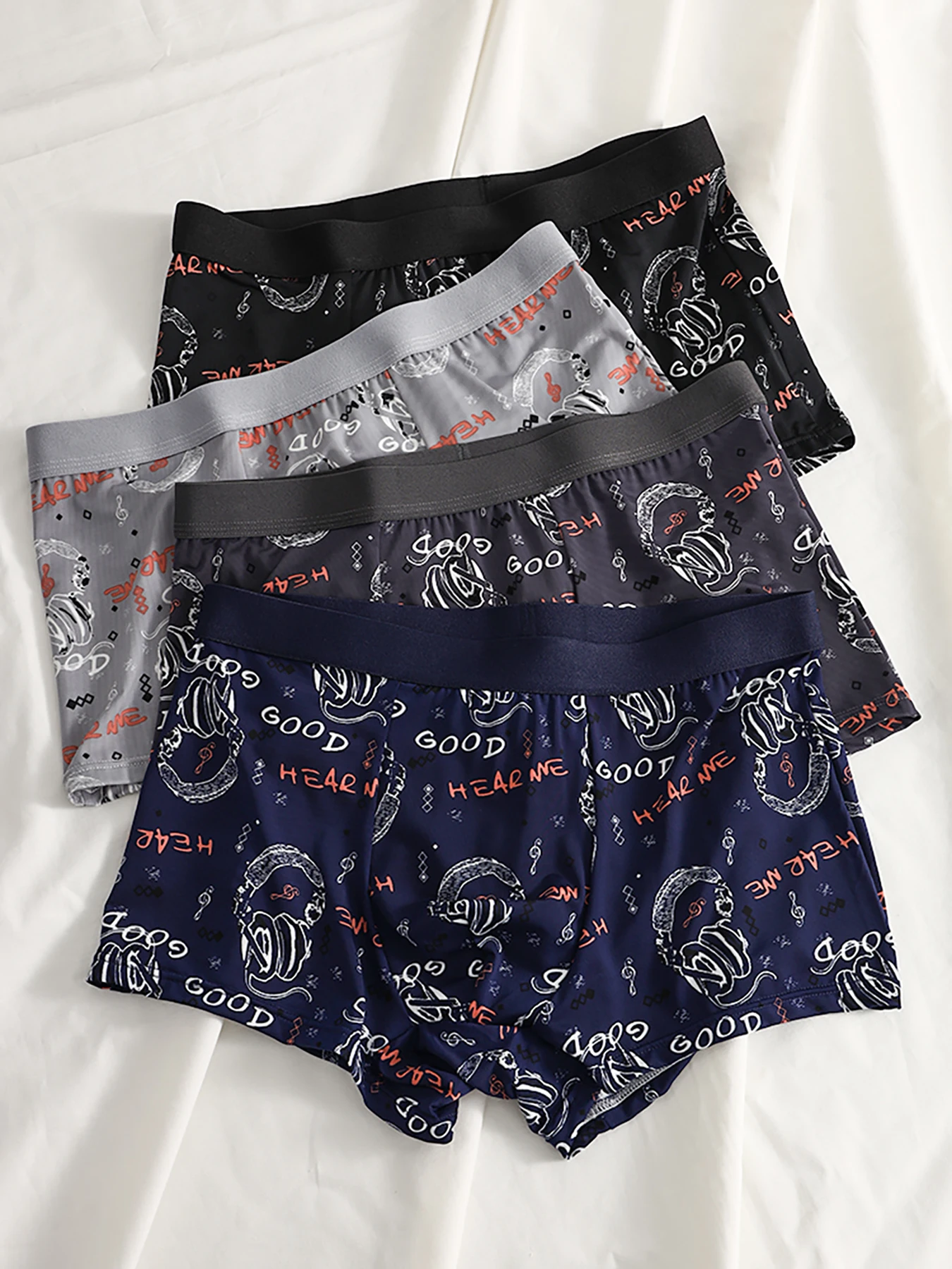 

4-Piece Men's Ice Silk Boxer Briefs - Music Graphic, Trendy Waistband, Premium Cooling Comfort