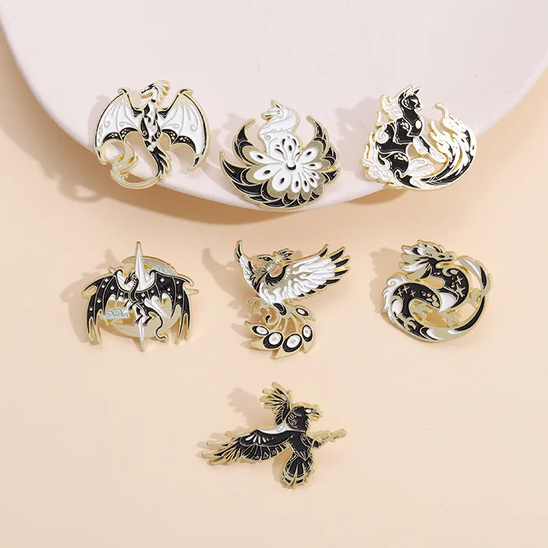 

Black and white cartoon style dinosaur monster brooch cartoon animal Dapeng bird nine tailed fox koi crane brooch