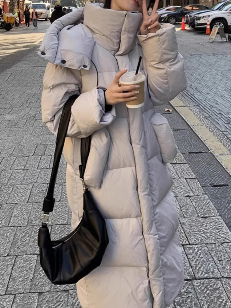 ZMEENNA المرأة سترة طويلة منتفخة الوقوف طوق مقنعين البريدي الكامل شتاء دافئ ماكسي ملابس خارجية فضفاضة تناسب الأسود ZM4478