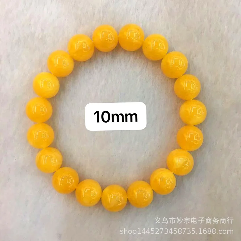 Natural second-generation bracelet with chicken oil yellow and floral patterns, Buddhist head charm, old amber prayer bead
