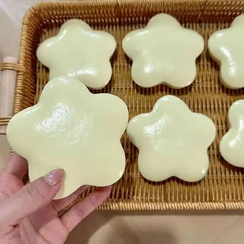 黄色いミルクの香りの星型スクイーズ玩具 - スローライジング超ソフトストレス解消減圧玩具、ストレス解消のための面白いギフト