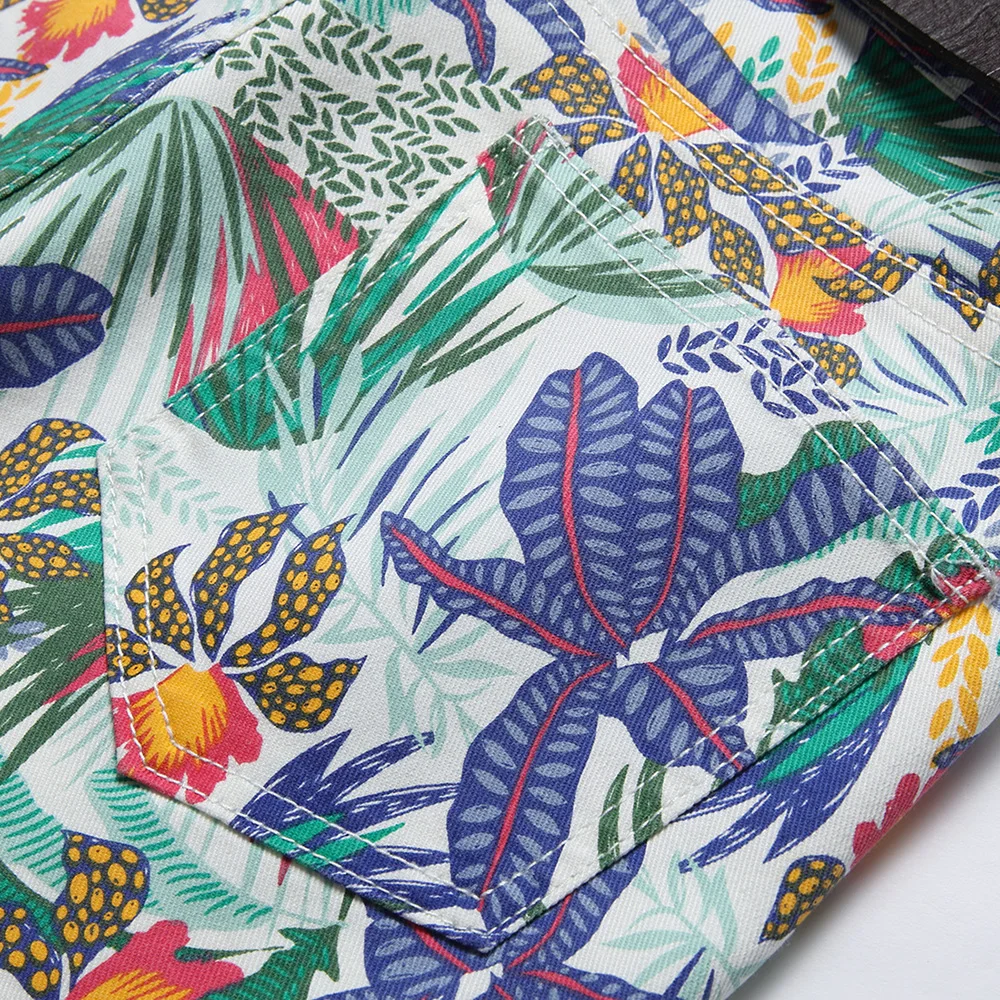 Pantaloncini di jeans elasticizzati con stampa digitale da uomo pantaloni da equitazione con fiori di piante tropicali di moda per l'estate