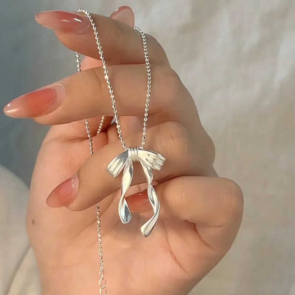 جديد الأرز حبة ضئيلة القوس قلادة الراقية الانحناء بسيط القوس الملحقات خمر سلسلة الترقوة