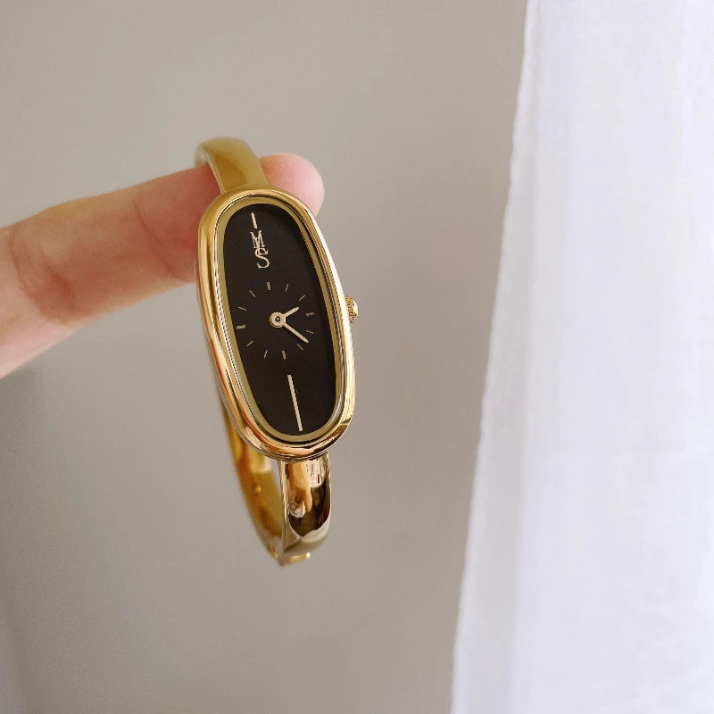 

Роскошные женские часы 2025 года, часы в стиле браслета, длинная овальная форма, элегантные женские часы из черного золота из нержавеющей стали, подарок
