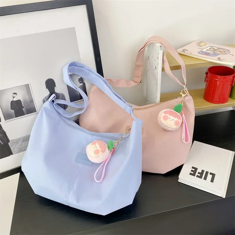 حقيبة كتف نسائية كاجوال من النايلون موضة كورية بسيطة على طراز الكلية حقيبة كروس ذات سعة كبيرة حقيبة يد للسيدات