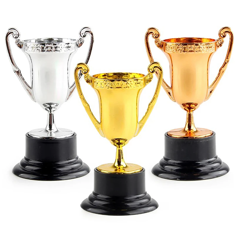 

1pc Mini Honorary Trophy Plastic Sports Meet Rewards Props Game Prize Cup School Party Toy Gold Silver Bronze Trophies Ornaments