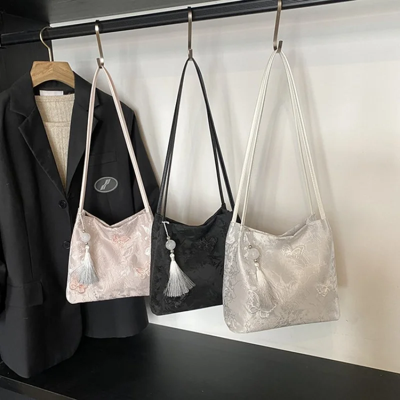 Bolso de mano de cuero de diseñador famoso para mujer, bolso de viaje elegante con detalles clásicos a la moda de marca de lujo ​