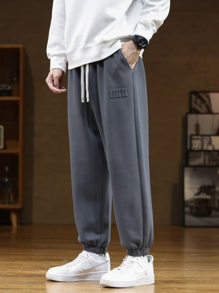 

Autumn Men's Casual Pants Solid Color Loose Drawstring Sweatpants Print Fashion Foot Binding Basketball Trousers Male
