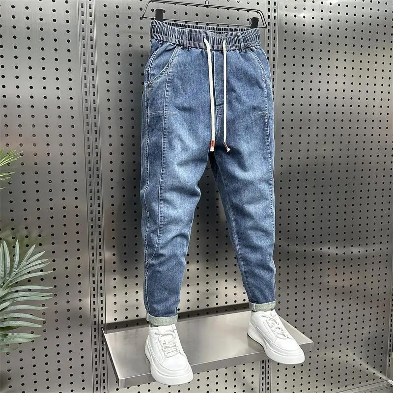 Fashion mewah longgar pinggang elastis Denim Harem Jeans pria pakaian desainer longgar Jogger Celana kasual biru untuk pria