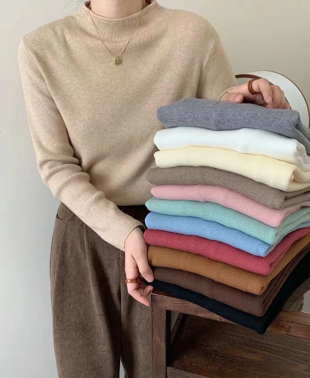 Nueva moda mujer Color sólido Simple básico suelto Casual moda medio cuello alto manga larga suéteres de punto camiseta interior femenina