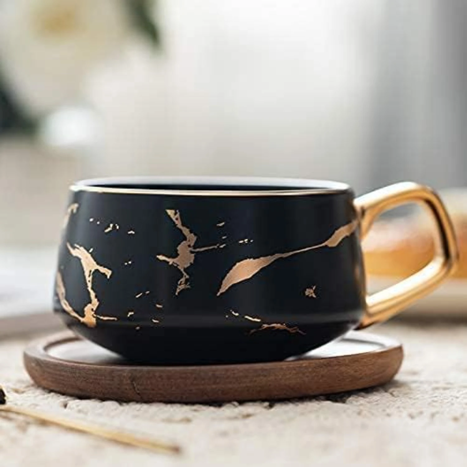 Luxurious and Elegant Matte Marble Ceramic Tea Coffee Cups with Stylish Black and White Luxury Wood Saucers, featuring Exquisite