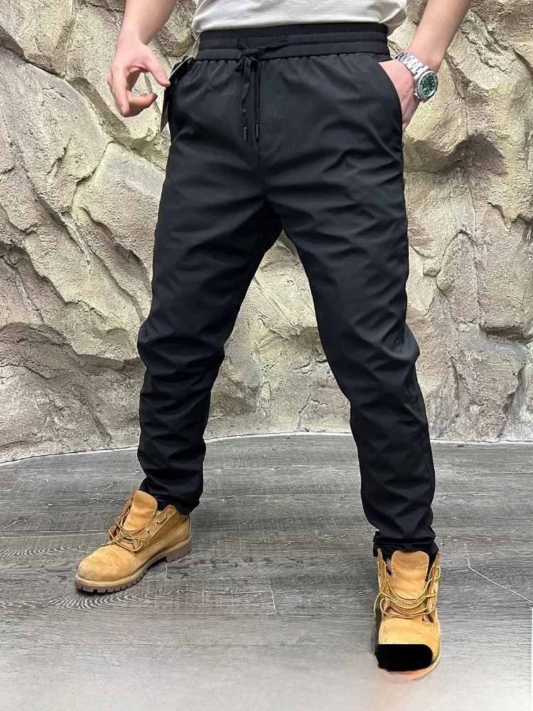 

Зимние теплые самонагревающиеся брюки из гусиного пуха, водонепроницаемые, ветрозащитные, устойчивые к сильному холоду, молодежные повседневные длинные брюки, модные...