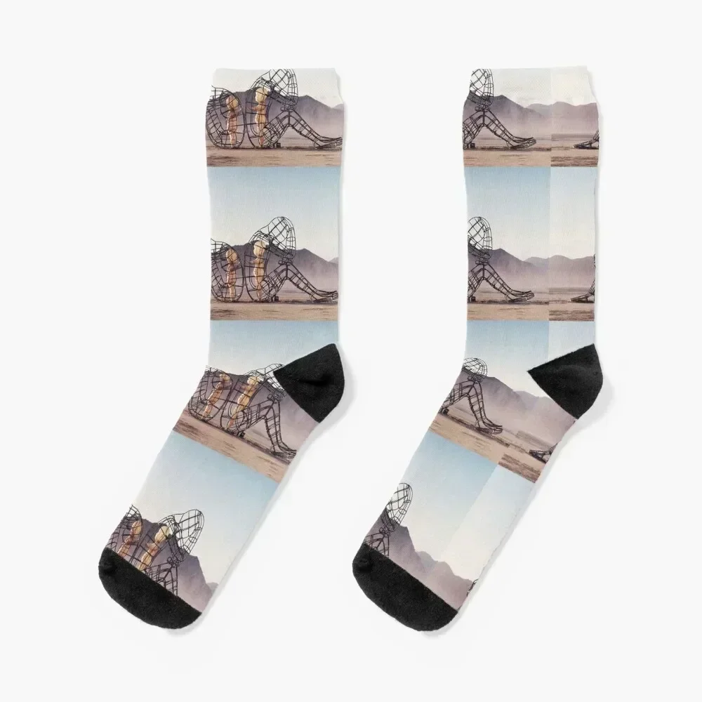 

7. Architecture of two persons turning their backs to one another at Burning Man. Socks Stockings Socks Male Women's