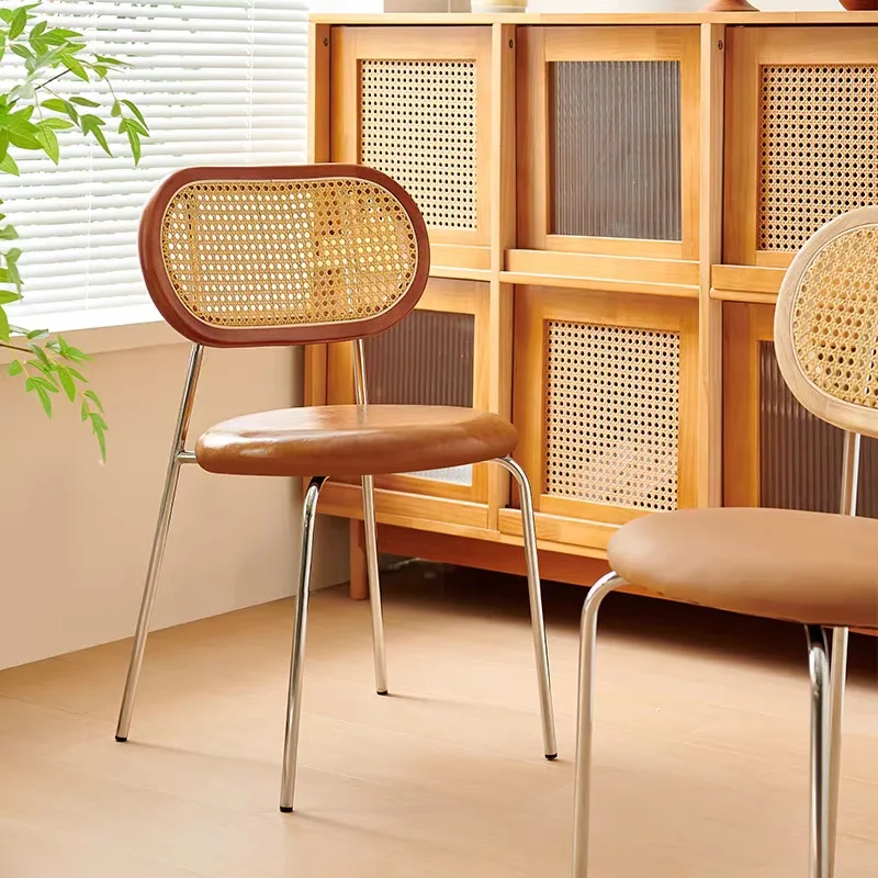 

Nordic rattan dining chair light luxury medieval restaurant dining table and chair casual solid wood rattan back chair