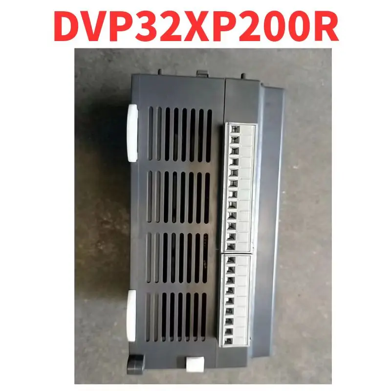 Dismantled in good condition DVP32XP200R PLC module