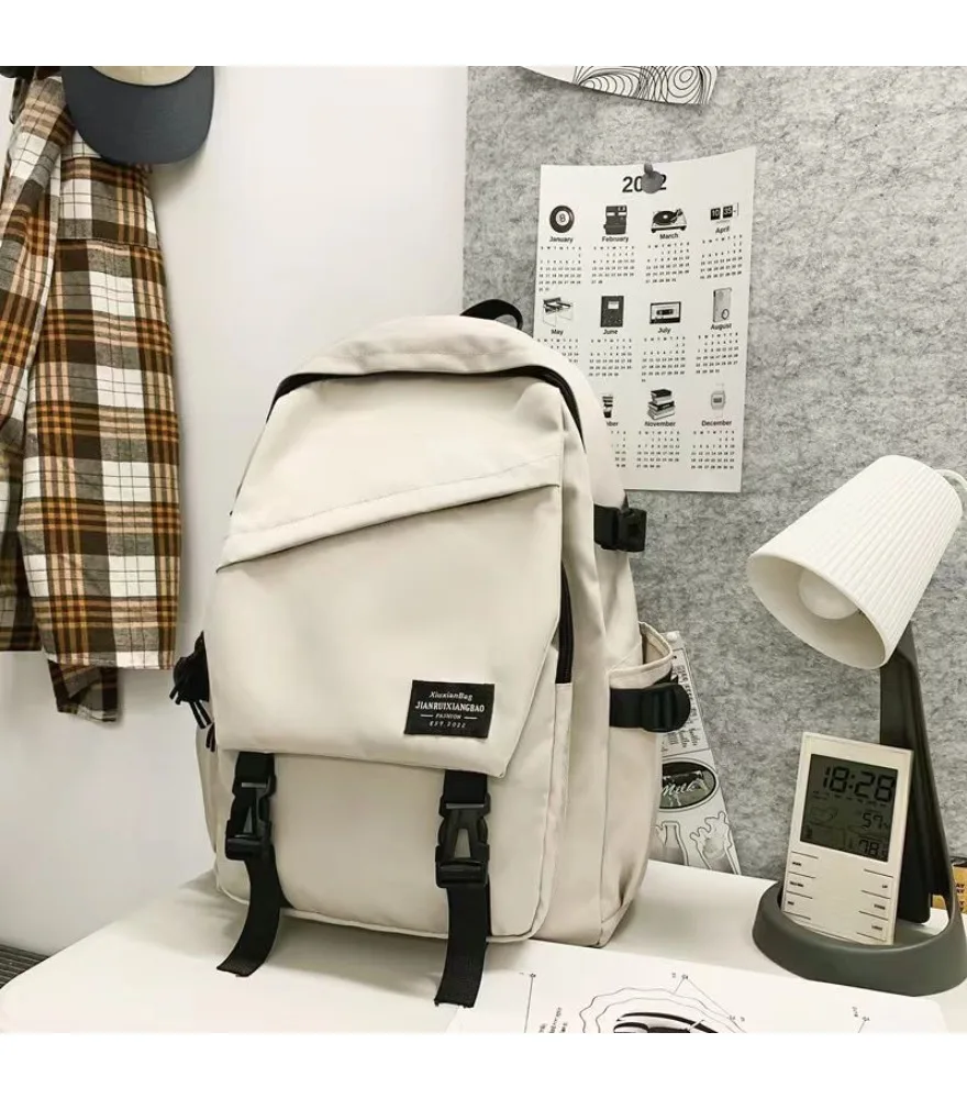 

Large capacity leisure travel backpack female junior high school student high school student schoolbag backpack male simple and