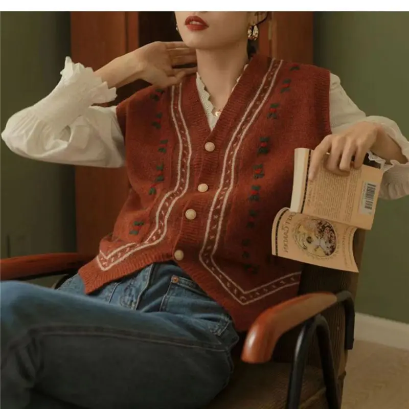 Suéter de un solo pecho para mujer, chaleco Retro bordado asimétrico sin mangas para otoño e invierno, chaleco informal elegante con cuello en V