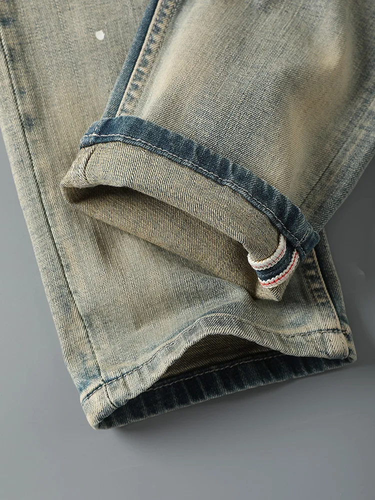

American retro jeans men's 2025 new style small feet yellow mud dyed ripped hole casual nostalgic long pants