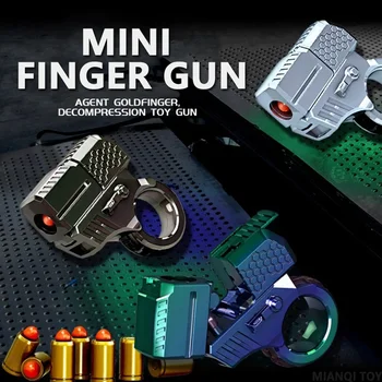 Nuovo Mini lancio Shell Bullet Gun Decompression Toy Metal Finger Gun giroscopio con punta delle dita può lanciare Soft Play Boy Gift
