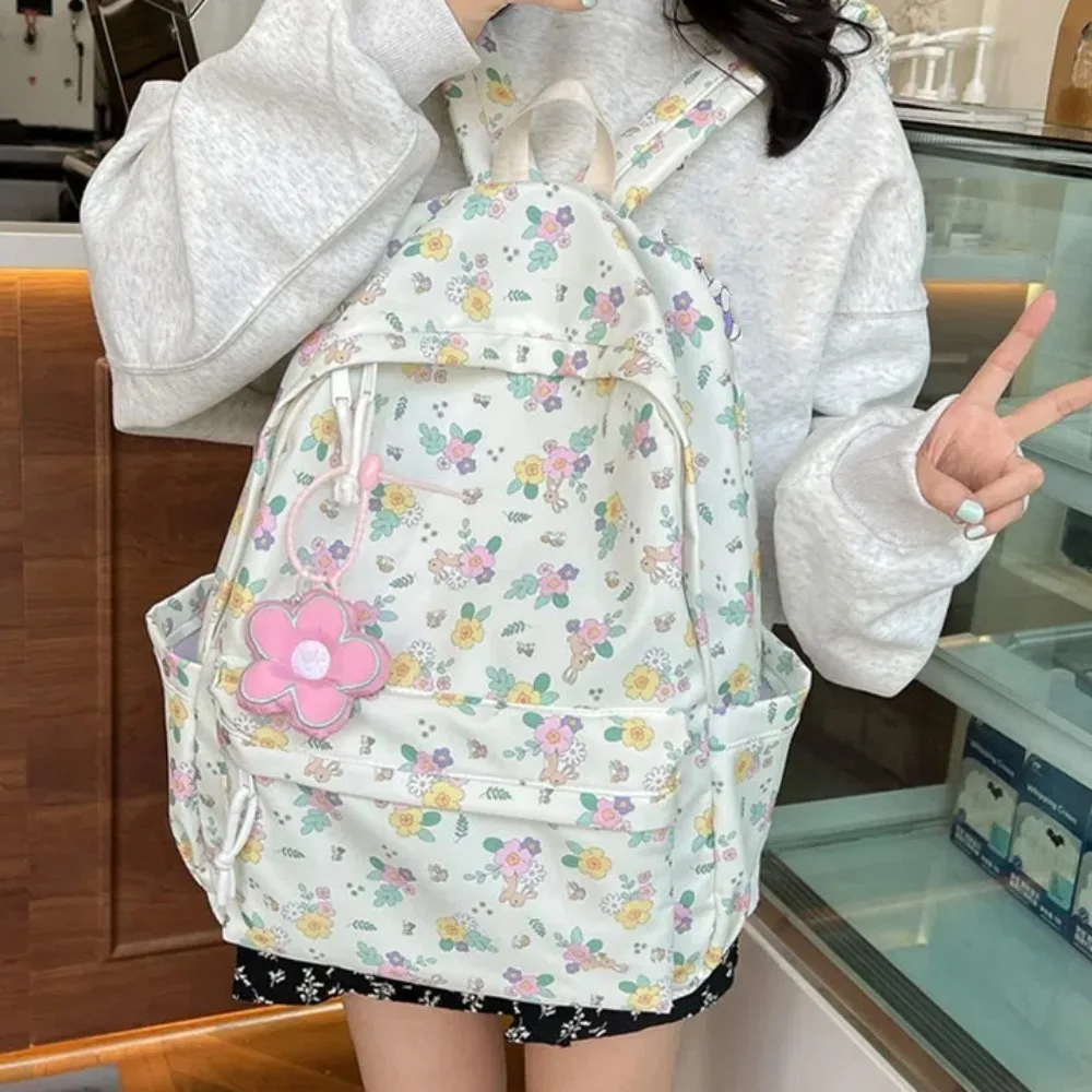 

Новый вместительный студенческий рюкзак, нейлоновые водонепроницаемые школьные ранцы, женский рюкзак с цветочным принтом для студентов