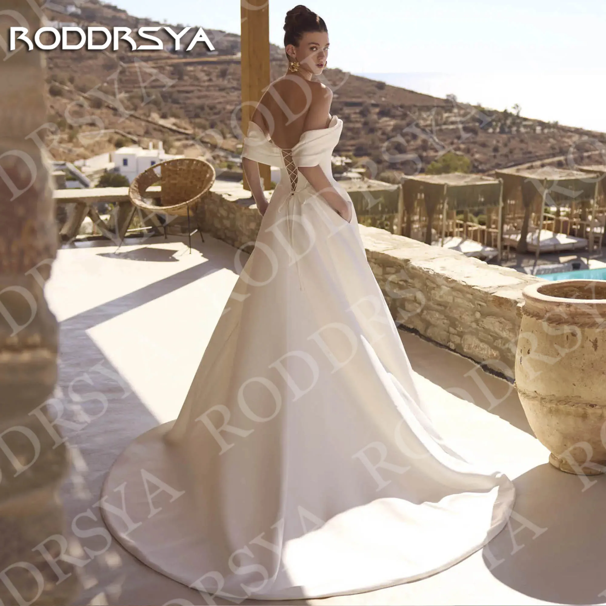 فستان زفاف RODDRSYA للشاطئ مفتوح الظهر من الساتان بسيط بدون أكتاف على شكل حرف A فساتين زفاف برقبة على شكل قلب مخصصة مع جيوب شاطئ مفتوح ظهر فستان الزفاف الساتين بسيطة قبالة الكتف خط فساتين العروس حبيبي الرقبة مخصصة مع ج