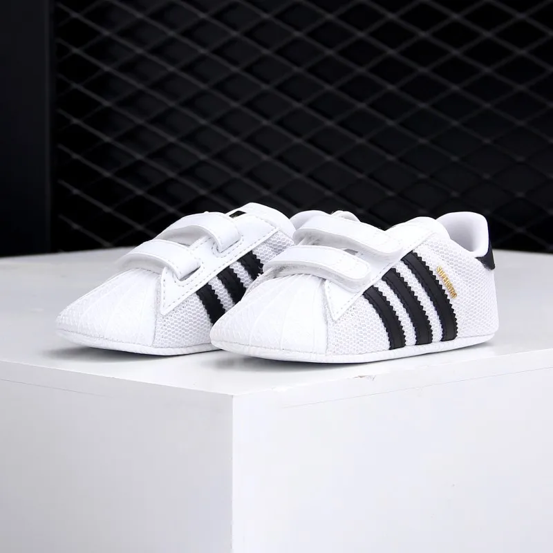 

Оригинальные спортивные кроссовки Adidas SUPERSTAR CRIB для маленьких мальчиков и малышей S79916