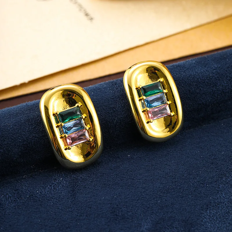 

Korean version of simple and exquisite arc inlaid three-color zircon versatile commuter temperament stud earrings